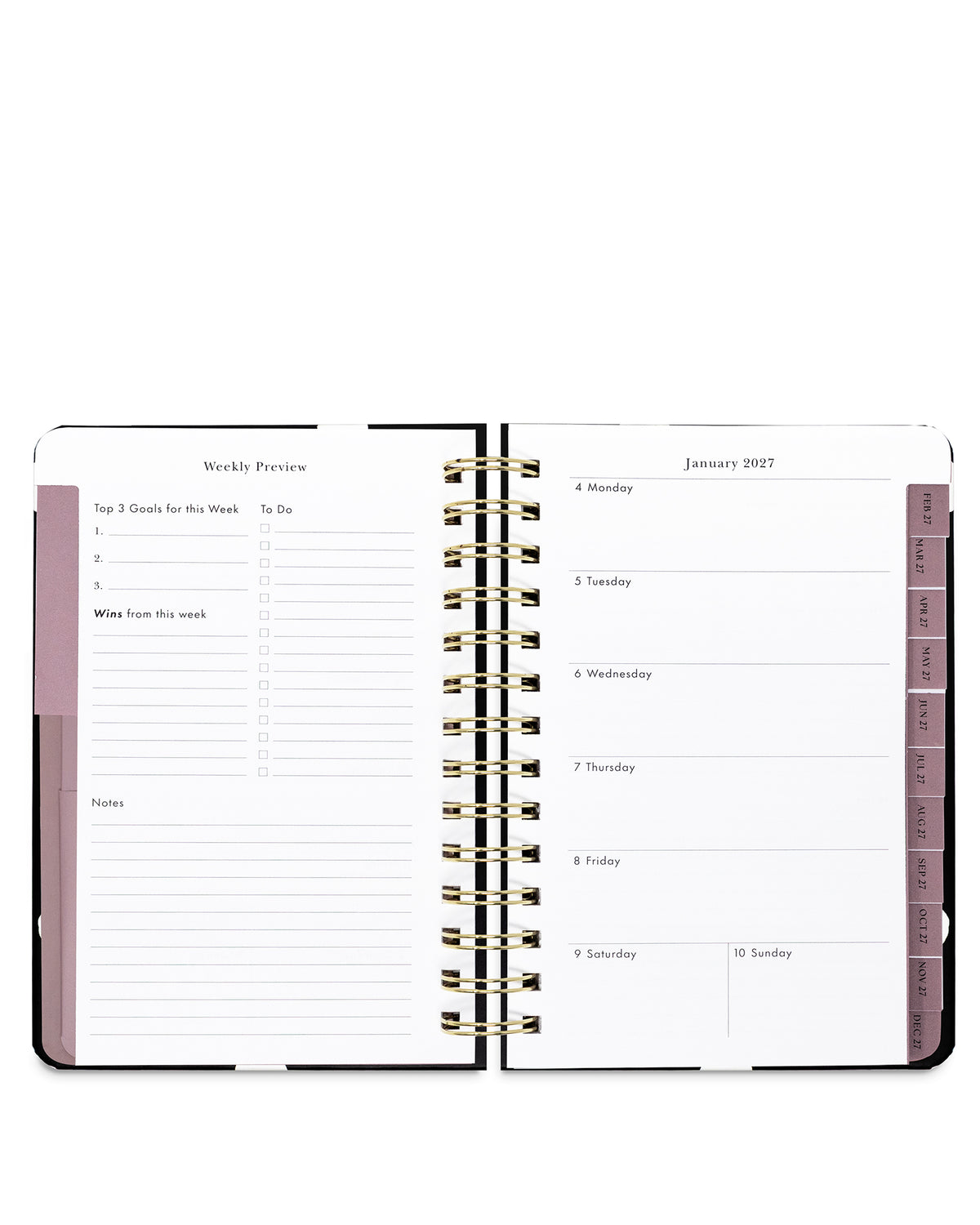 An open spiral-bound planner with white pages, gold-tone coil binding, and muted mauve-pink page headers and tabs on a plain white background.