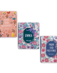 Three book-themed magnets with floral designs and book titles on a white background