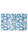planner with blue floral and celestial design on a white background