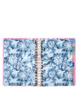 Open planner with celestial design on a white background
