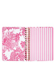 planner with pink floral and striped design on a white background