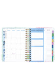 Woven planner with colorful tabs on a white background