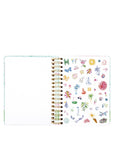 Planner with colorful stickers on a white background