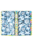 Planner with celestial design and colorful tabs on a white background