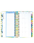 Planner with colorful tabs on a white background