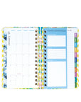 Multicolored planner with monthly and weekly layout on a white background