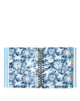 Open planner with blue floral design on a white background