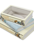 Stack of decorative books with Winnie the Pooh illustrations on a white background