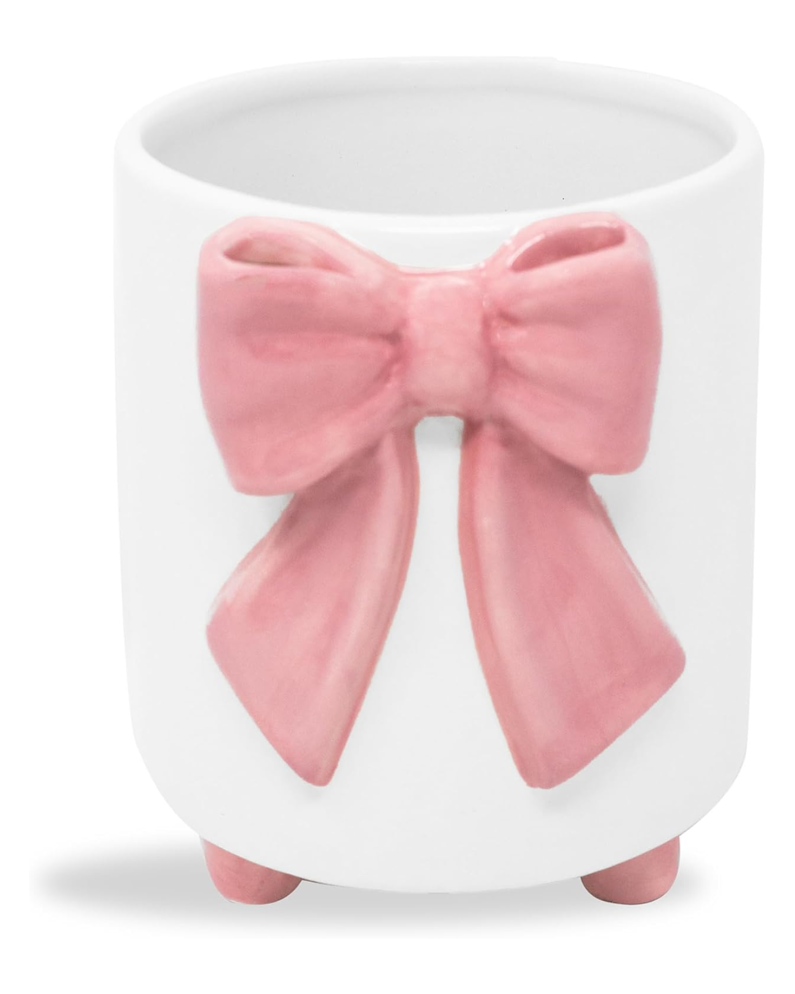White ceramic planter with a pink bow on a white background