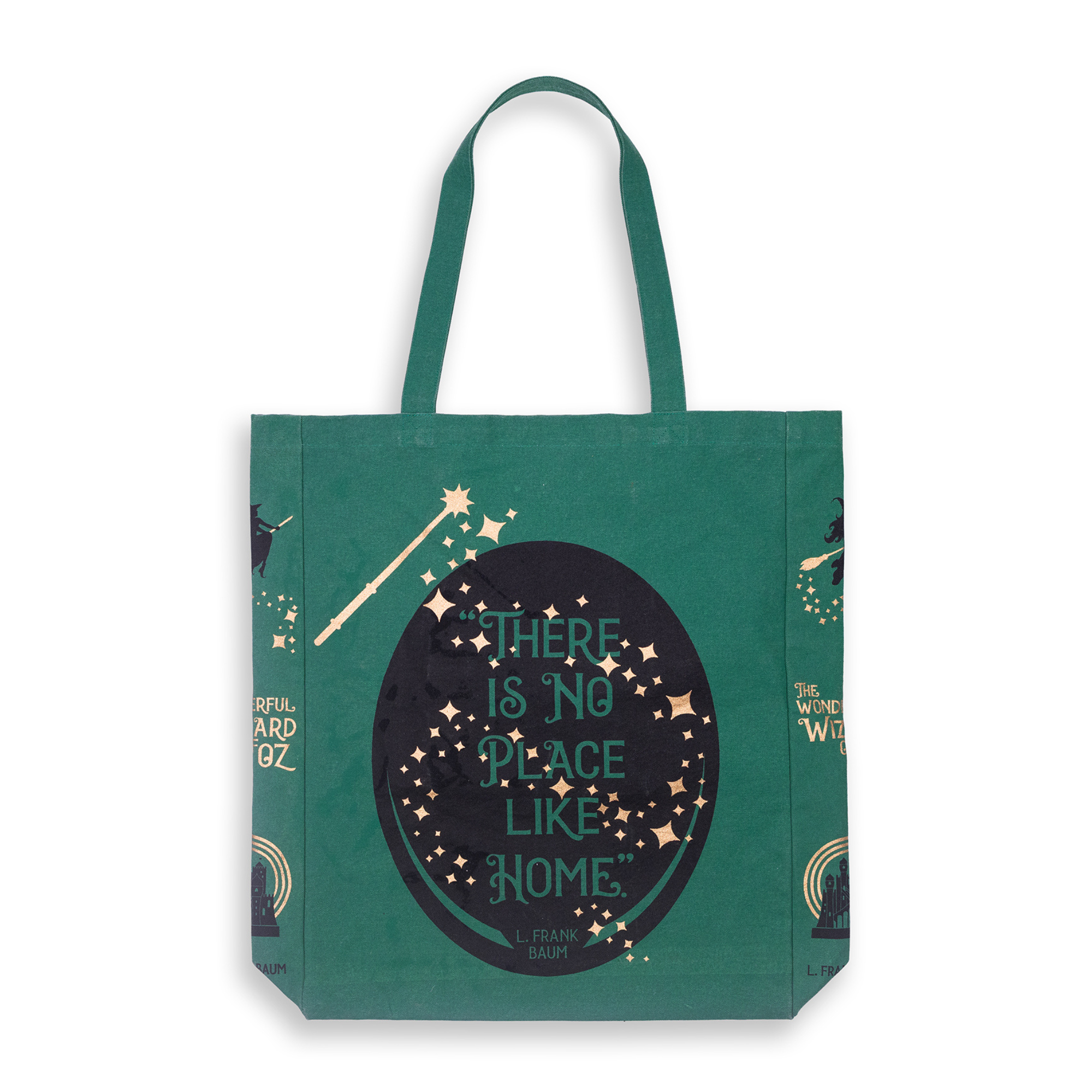 Green tote bag with 'There is No Place Like Home' quote and star designs on a white background