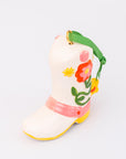 Ornament cowboy boot with floral design on a white background