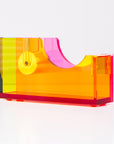 Colorful tape dispenser with yellow, pink, and red colors on a white background