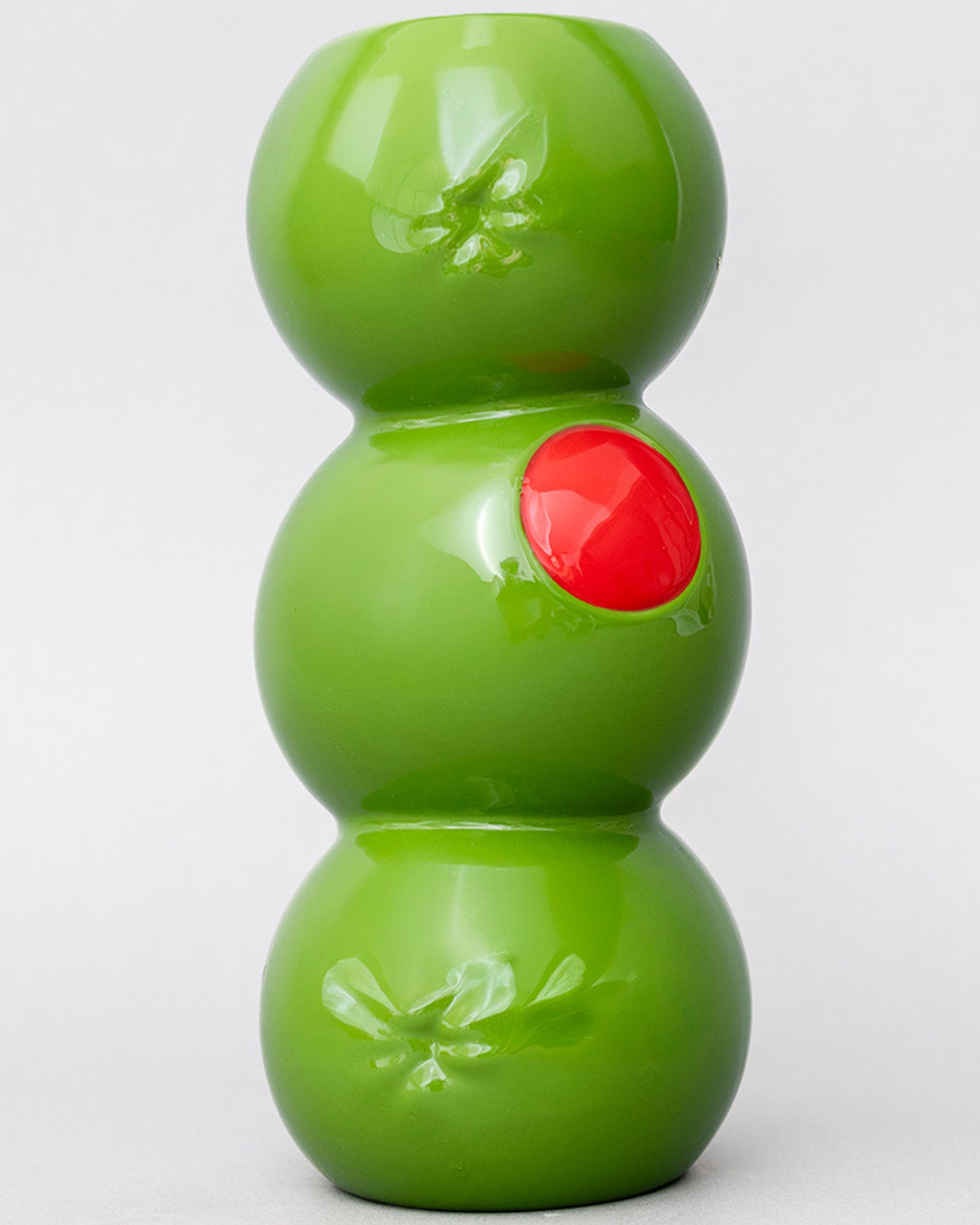 Green olive vase with a white background