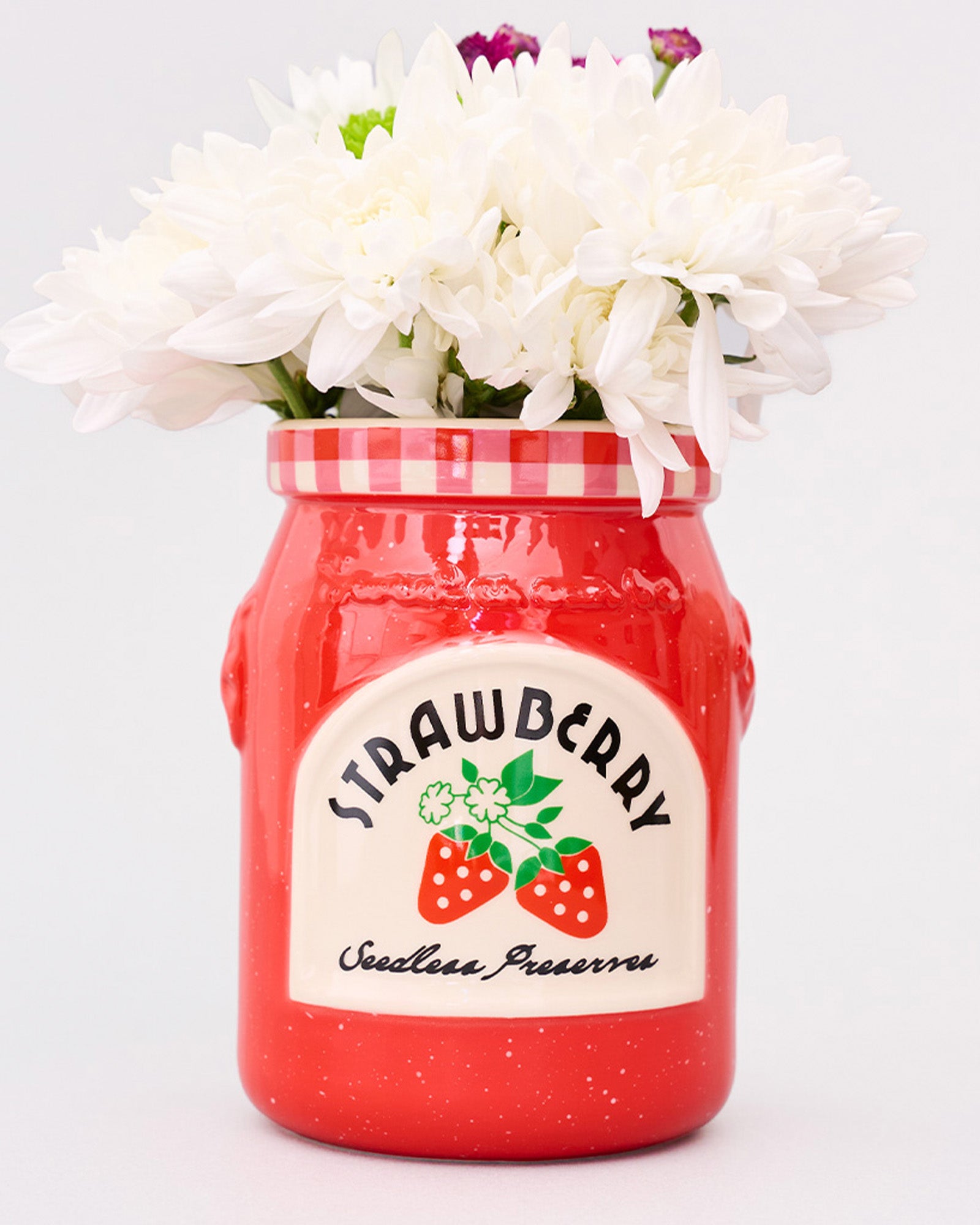 strawberry jam petite ceramic vase with a bouquet in the top