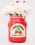 strawberry jam petite ceramic vase with a bouquet in the top