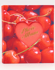 Photo album with red cherries and a heart-shaped cutout displaying 'Photo Album' text.