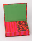 Colorful box with a green lid, red and pink striped sides, and cherry design on a white background.