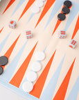 Backgammon board with pieces and dice on a light background
