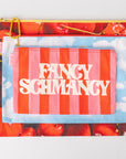 Pouch with cherry design and 'Fancy Schmancy' text on a white background