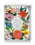 Decorative box with floral design and inspirational quote on a white background