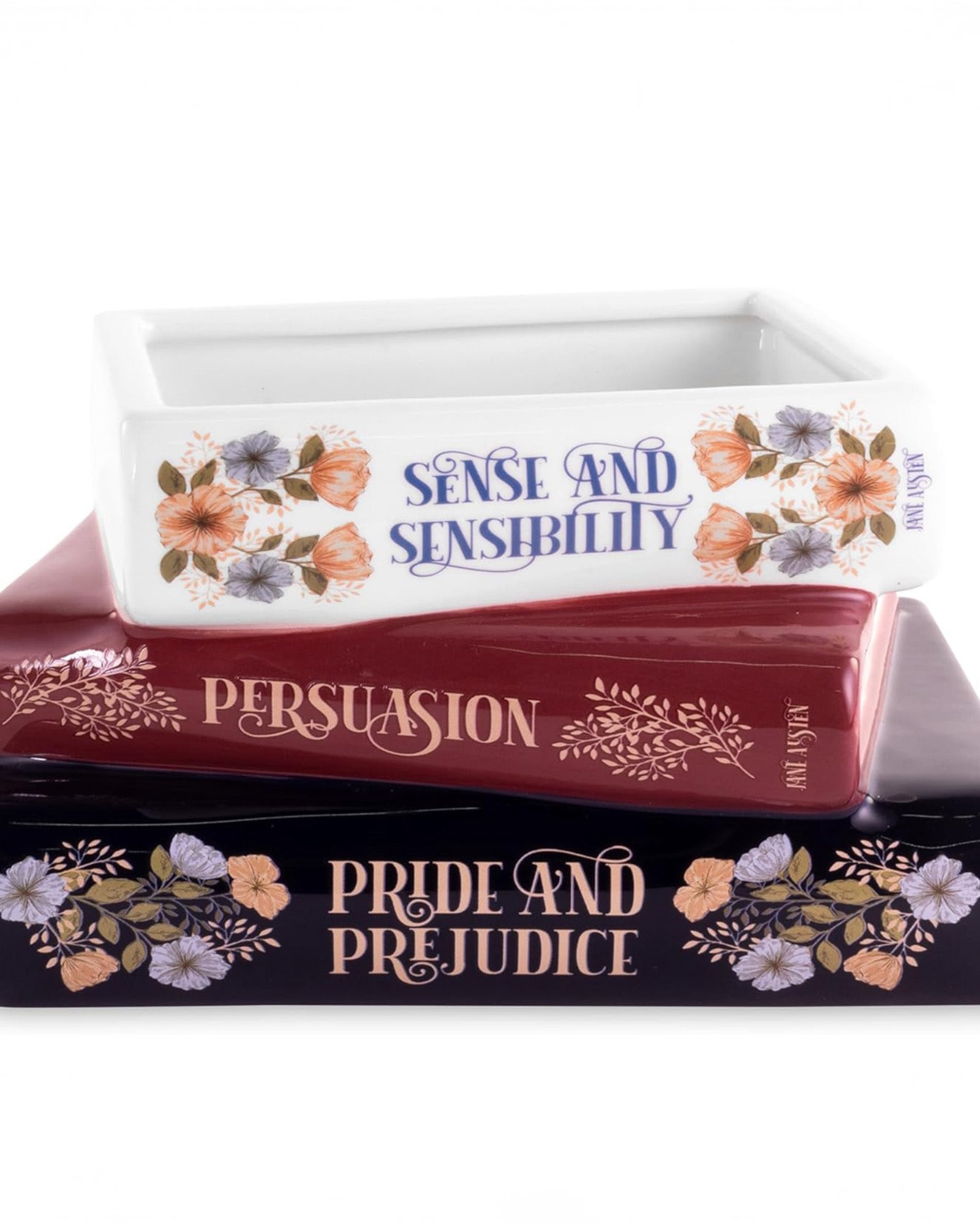 Stack of books with 'Pride and Prejudice', 'Persuasion', and 'Sense and Sensibility' on a white background