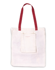 White tote bag with red handles on a white background