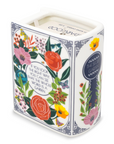 Floral-themed candle with decorative design and text on a white background