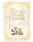 Book cover of 'The House at Pooh Corner' with decorative elements and a illustration of a character and a bear.