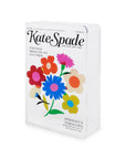 Kate Spade book vase with colorful flowers on a white background
