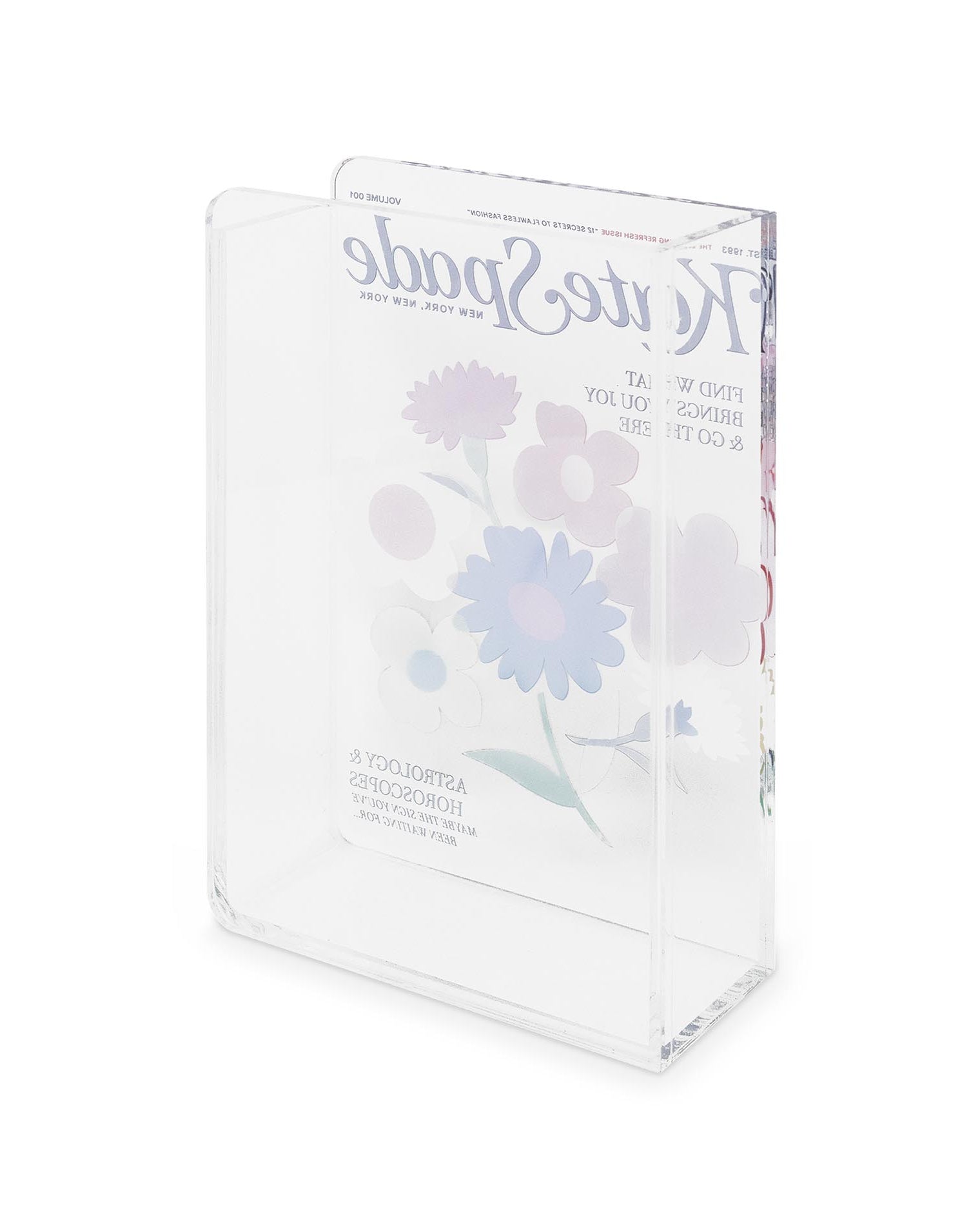 Back view of Kate Spade book vase with colorful flowers on a white background