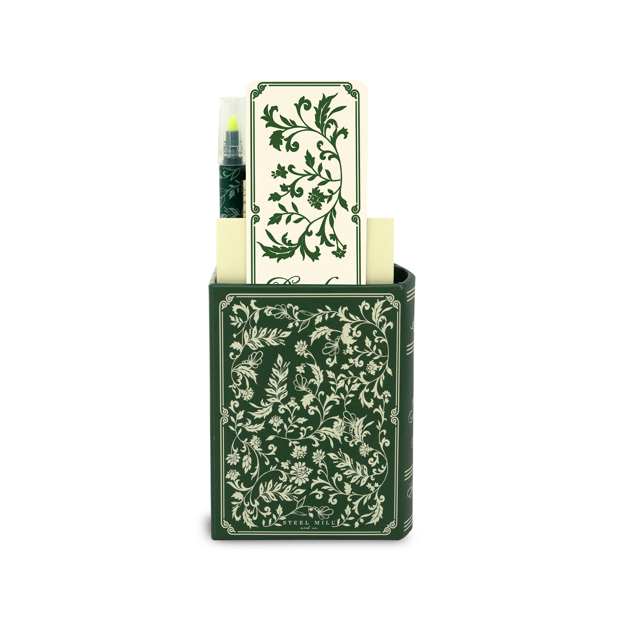 Stationery set with green floral design including a pen, paper, and holder on a white background.