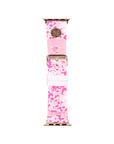 Pink floral patterned watch band with gold clasp on a white background