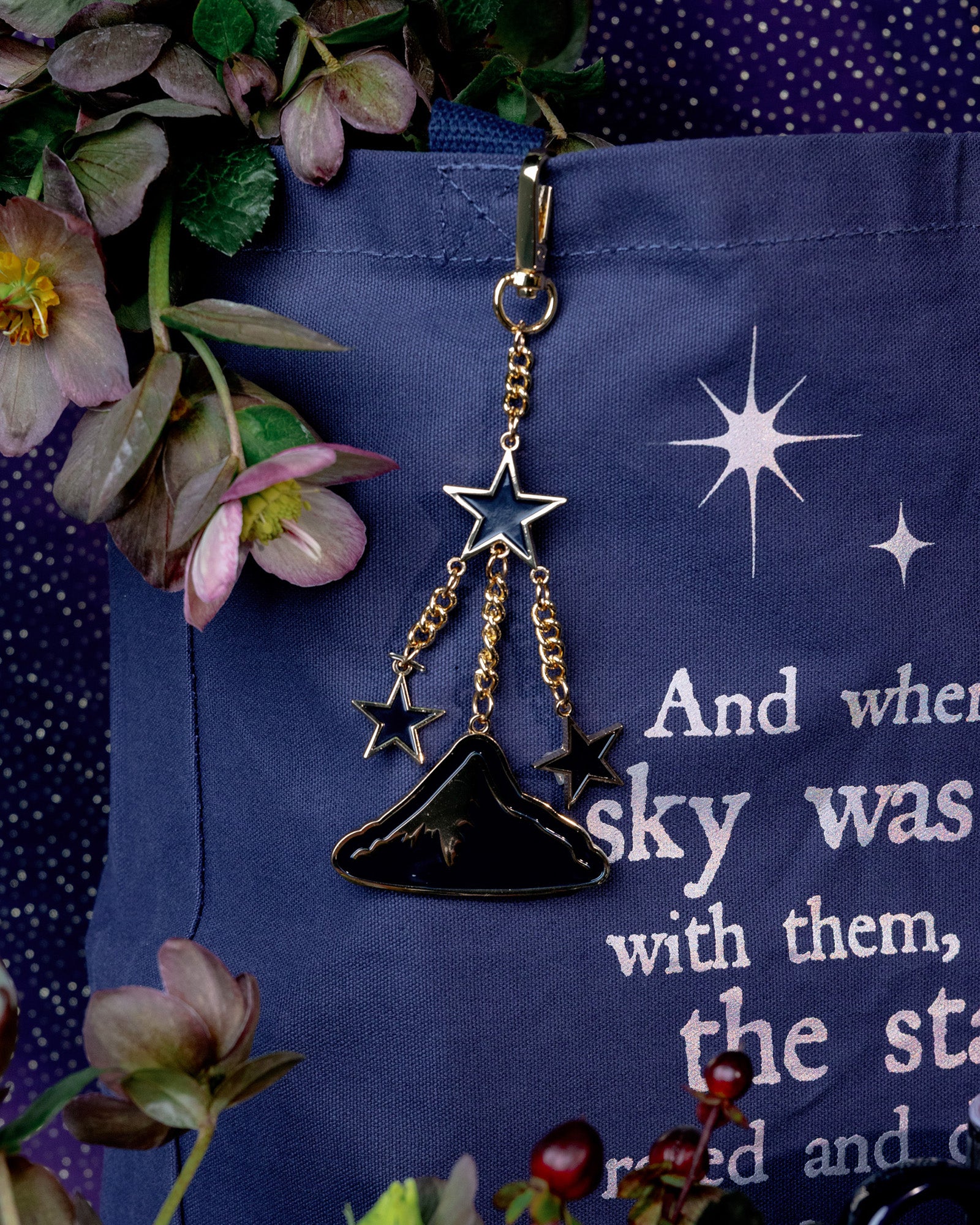 black mountain and star keychain with godl hardware