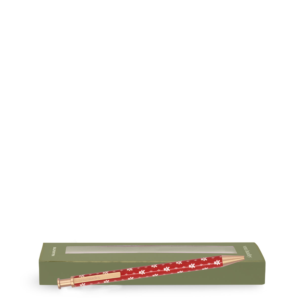 Boxed red retractable pen with a white teddy bear pattern and gold-toned accents, shown vertically against a plain white background.