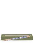 Pencil with decorative blue pattern in a green box on a white background