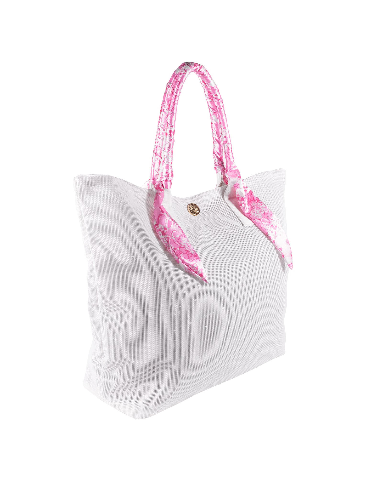 side view of white mesh tote beach bag with pink and white floral handles