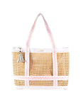 Woven tote bag with pink handle on a white background