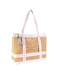 Woven tote bag with pink trim and white handle on a white background