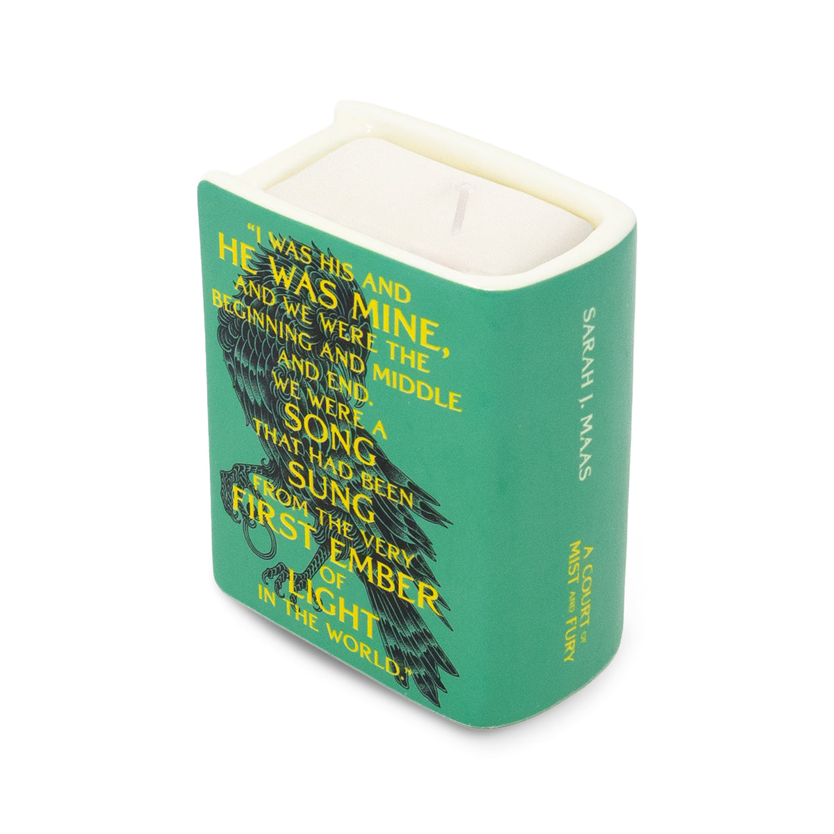 A teal green square candle in a book-shaped container with a white wax top and lid. The front cover features a black raven illustration and yellow text reading, "I WAS HIS AND HE WAS MINE, AND WE WERE THE BEGINNING AND MIDDLE AND END.