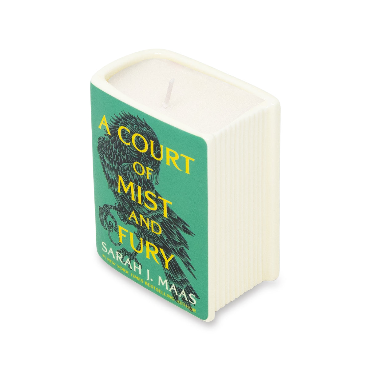 A square-shaped white candle designed to look like a book cover, featuring a teal front panel with the title 'A Court of Mist and Fury' by Sarah J. Maas in yellow text and a black bird illustration.