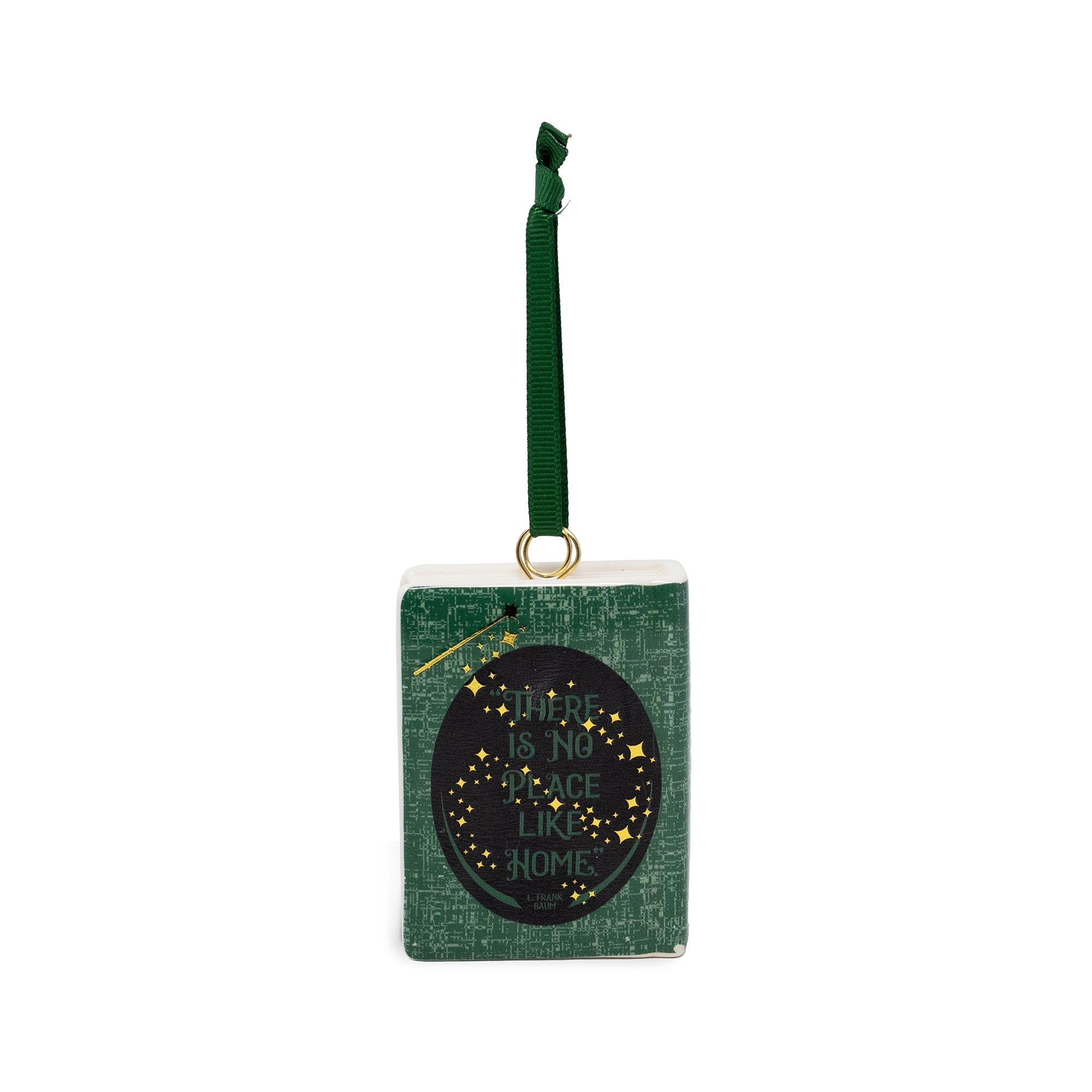Back view of small decorative ornament shaped like the book 'The Wonderful Wizard of Oz' with a green ribbon loop at the top, shown on a plain white background.