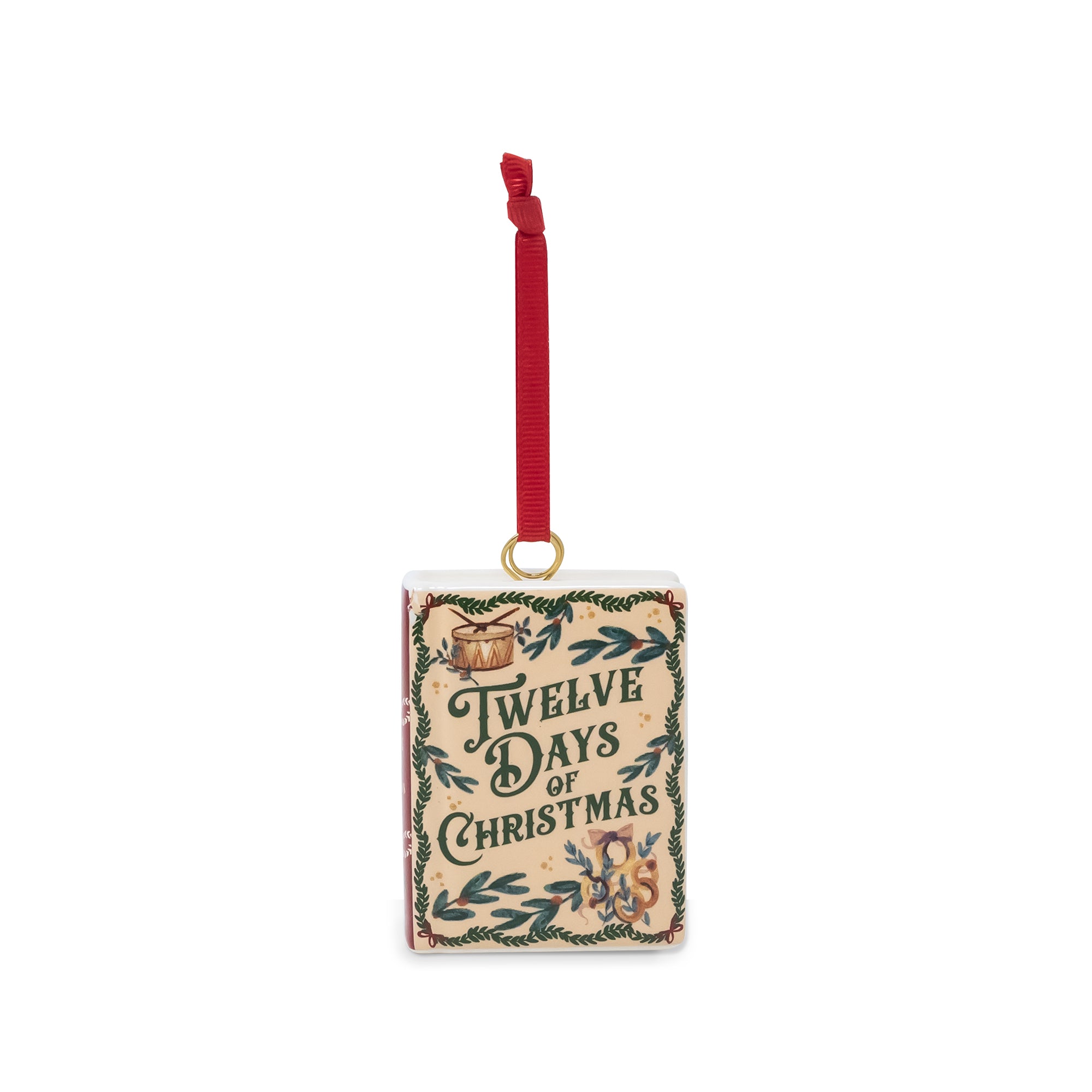 A rectangular Christmas ornament with a red hanging ribbon and gold loop, featuring the text 'Twelve Days of Christmas' in dark green lettering on a beige background with decorative green foliage and small holiday illustrations.