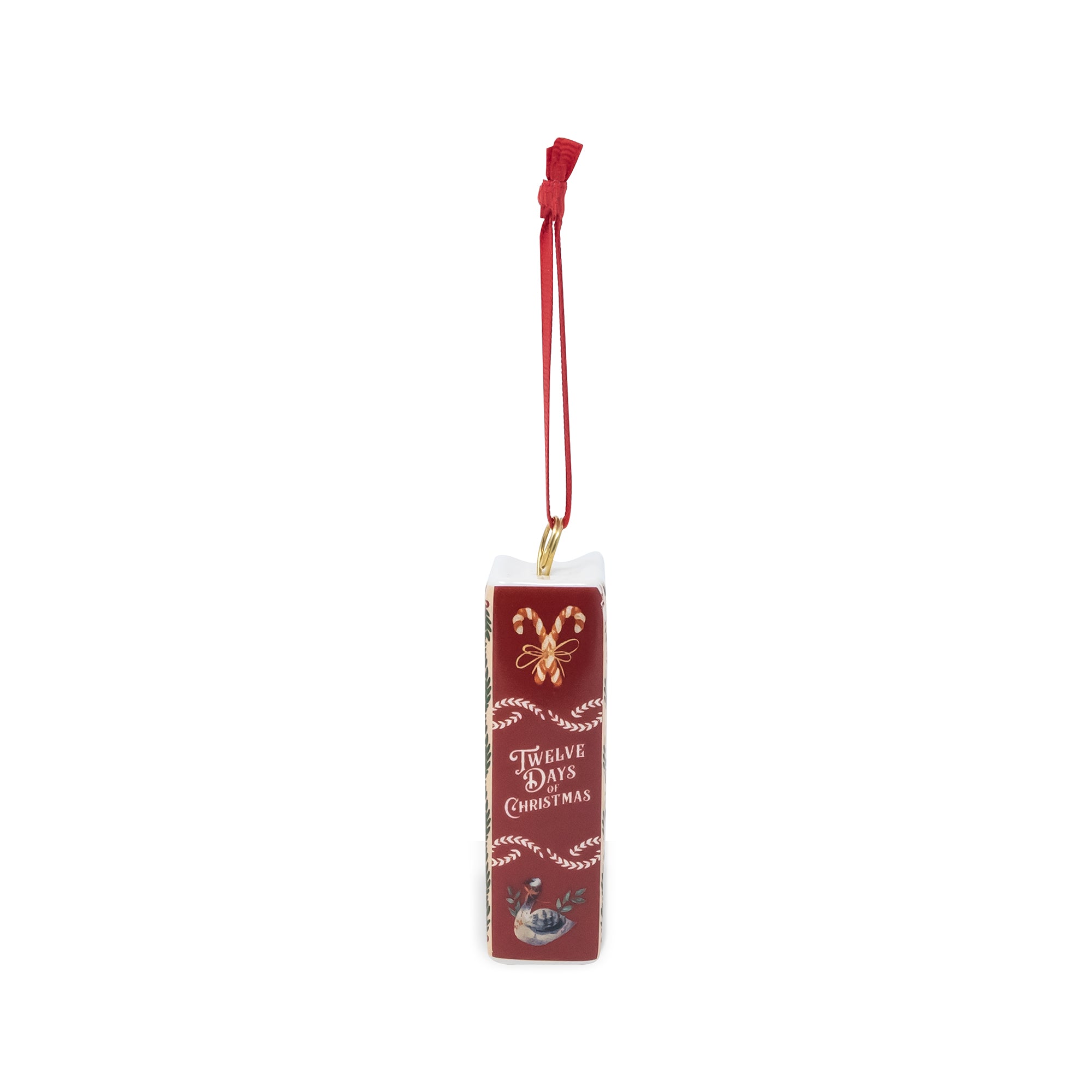 A rectangular Christmas ornament in deep red with white decorative and a gold hanging loop at the top, shown on a plain white background.