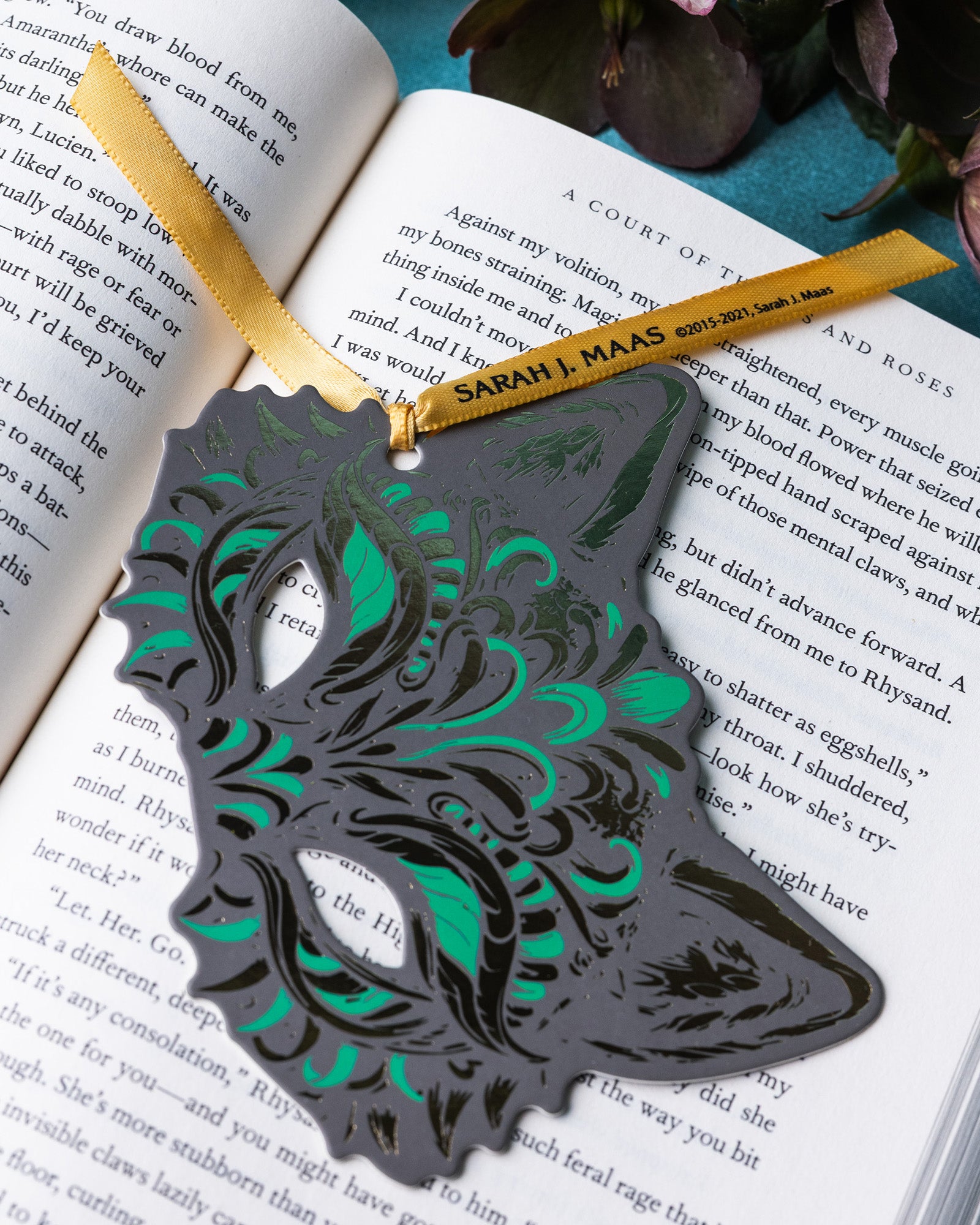 Green and gold wolf mask bookmark