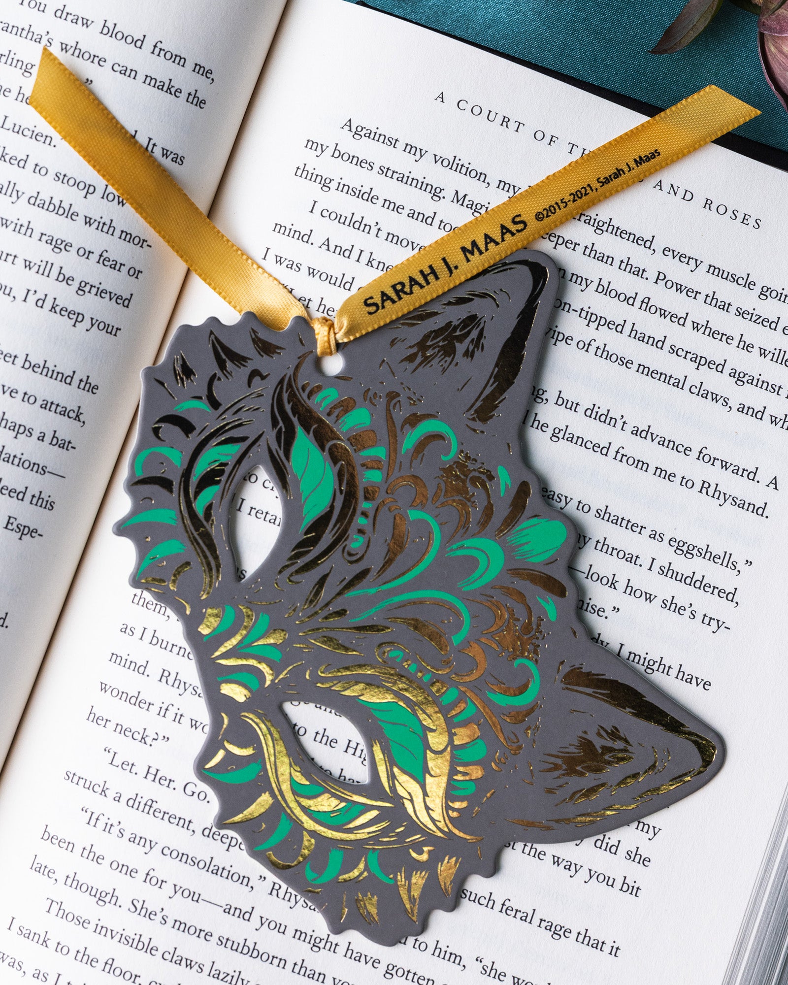 grey wolf mask bookmark with gold foil and green accents