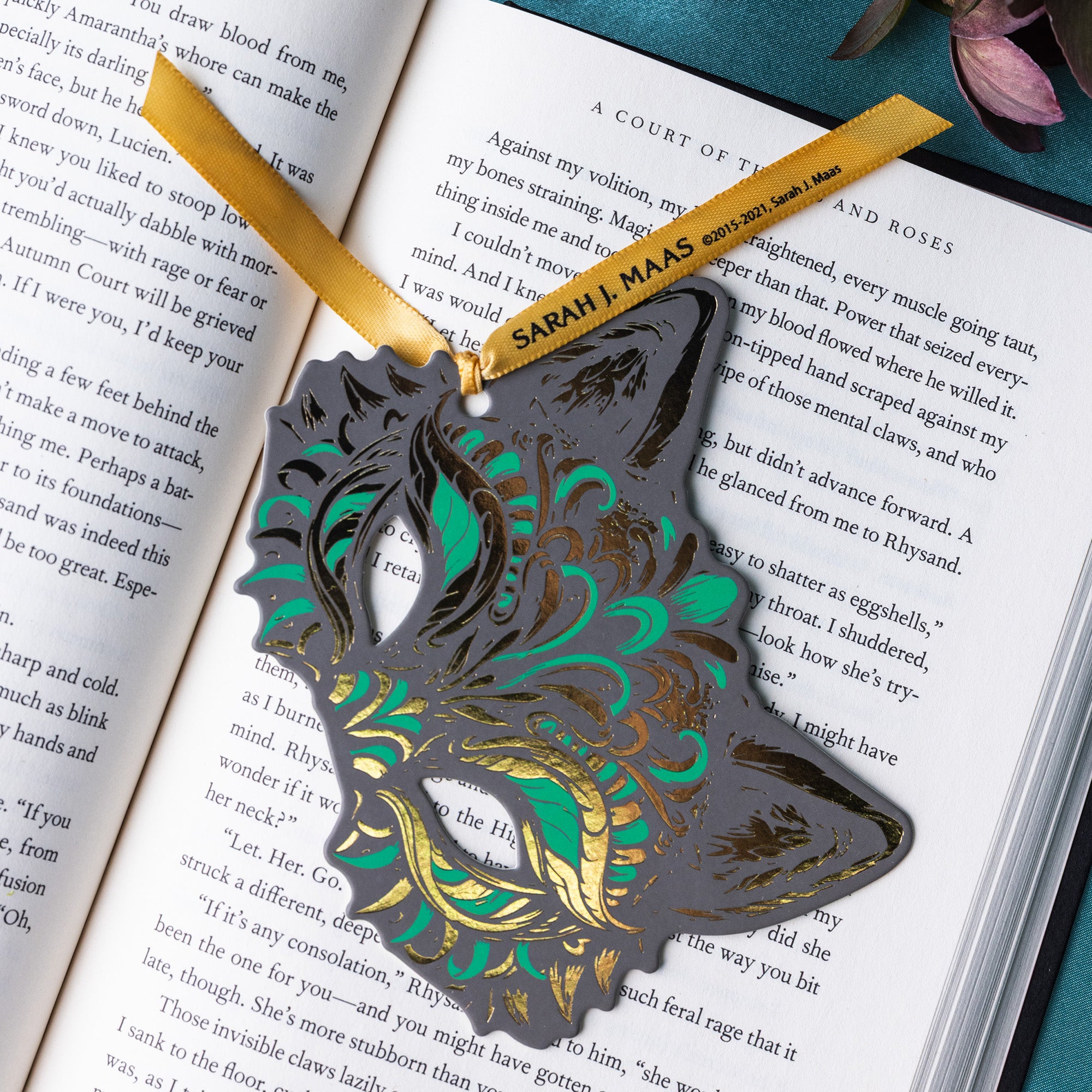 grey wolf mask bookmark with gold foil and green accents
