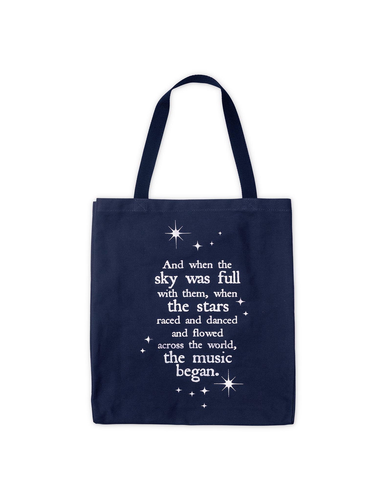 Navy tote bag with white text and star graphics on a white background