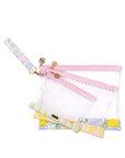 Set of three colorful carryall bags with floral and striped patterns on a white background