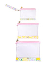 Set of three white pouches with colorful floral and striped patterns on a white background