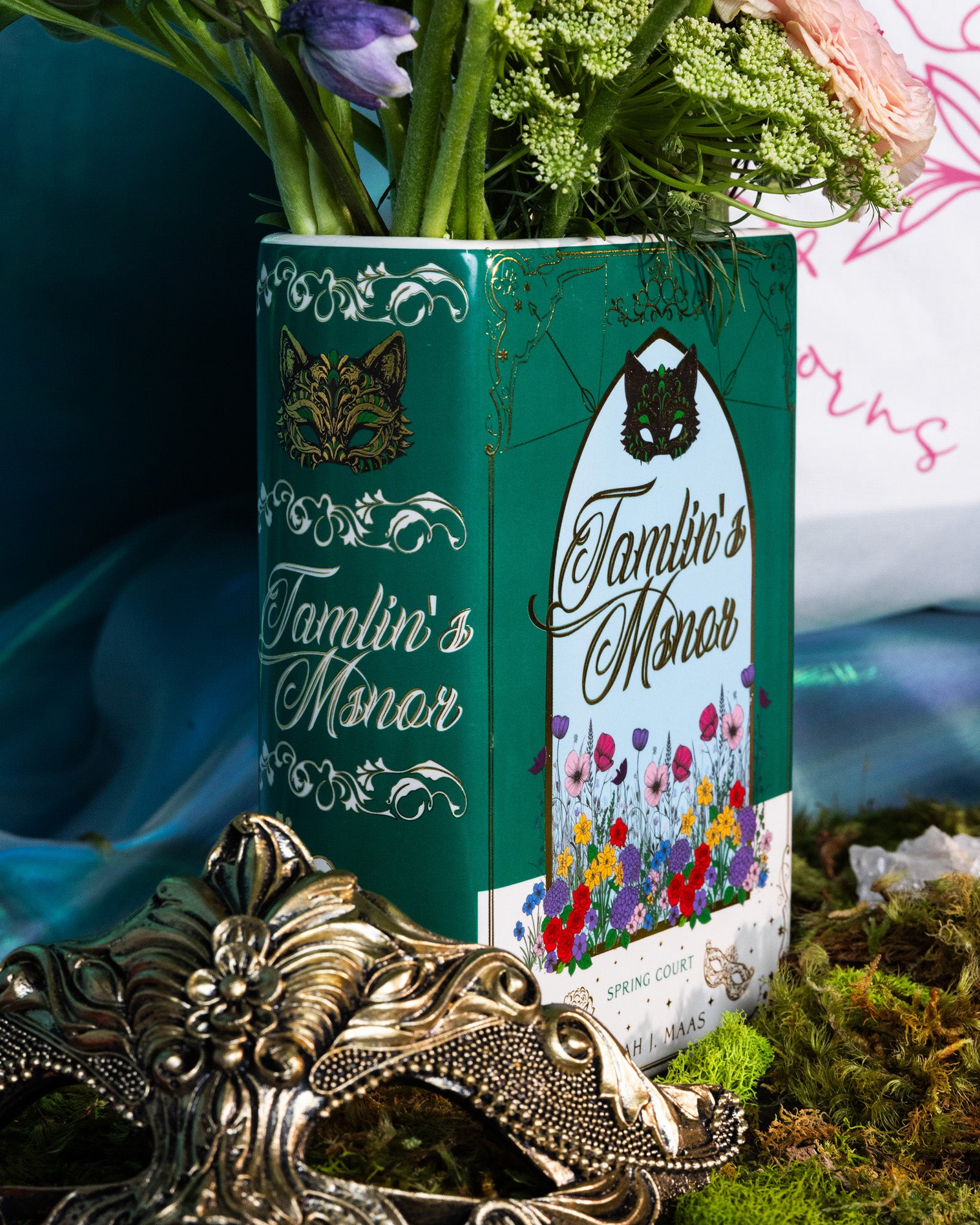side view of Book-shaped vase with 'Tamlin's Manor' design